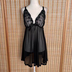 Black sheer slip mini dress with lace floral bust and sequin details